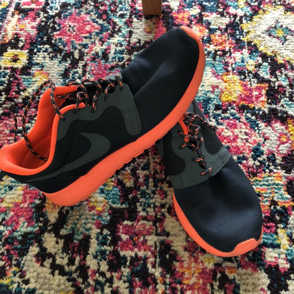 Coral & black Nike sneakers